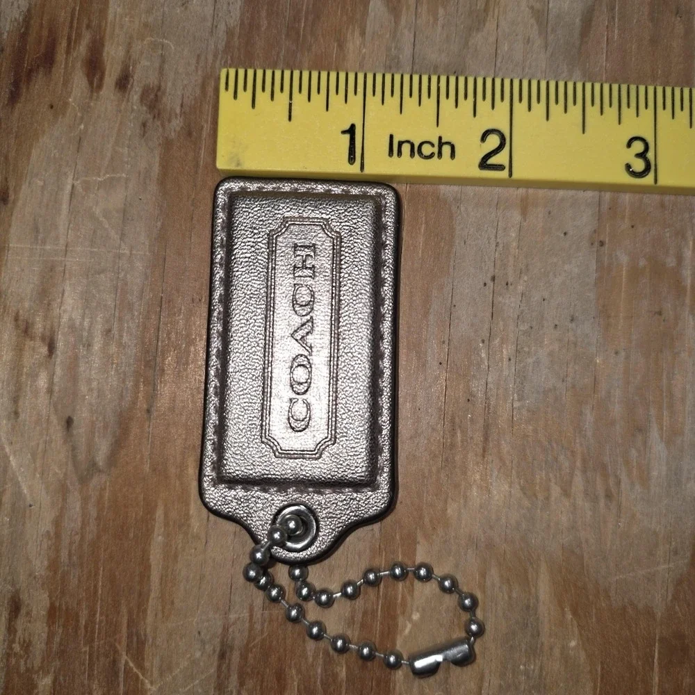 Coach bag tag